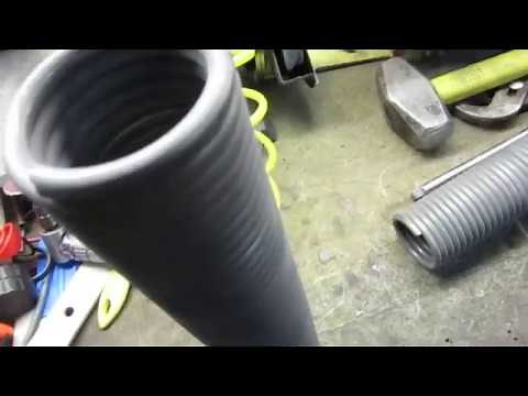 Garage door torsion spring replacement. Converting from a single spring to dual spring.