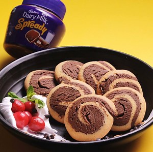 734K views · 1.4K shares | Chocolate Pinwheels - Spread it then swirl it!  #Cadburylicious // Cadbury Dairy Milk Spready Chef - Chef Nehal Karkera | Gobble | Facebook