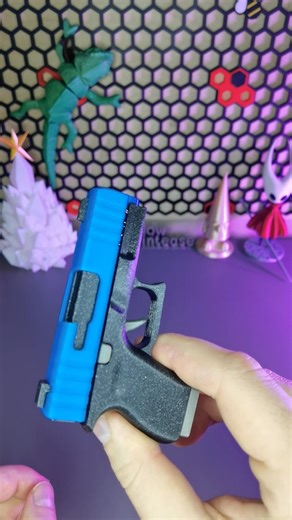 3D Printease | This mini slide-action glock fidget keychain is way too satisfying 😄🔄 3D printed desk toy that clicks smoother than your brain at 2AM. 👉... | Instagram