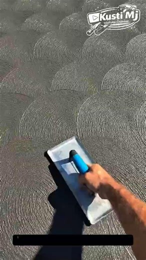 Concrete Surface Finishing with Semi-Circular Swirl Pattern.
