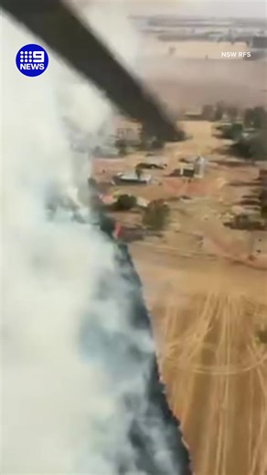 Incredible footage taken from a NSW RFS helicopter shows a rapidly moving grass fire in the state's Riverina region, near the Victoria border. The huge blaze, fuelled by searing temperatures and strong westerly winds, has destroyed over 1,000 hectares of land, but has now been contained. #9News LIVE UPDATES: https://nine.social/14oT | 9 News