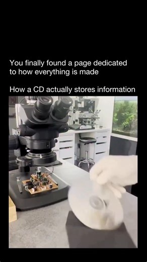 How Everything Is Made on Instagram: "Most people don’t realize that every CD stores its entire soundtrack or data as one long, microscopic spiral. Credits: @microscopie_44 Along that spiral are tiny dents called pits, separated by flat areas called lands. Each pit is incredibly small—about one-thousandth the width of a human hair. A CD player reads this spiral using a precise laser. When the beam hits pits and lands, it reflects differently, creating tiny changes in brightness. Those light chan