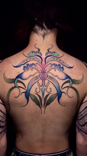 Abstract orchid back piece — soft flow, organic shapes, and elegant movement throughout the back. Tattooed by @mad If you like the work or have any questions, please don’t hesitate to contact us at 626-570-9224 or 714-847-8484 #abstracttattoos #colortattoo #spinetattoo #backtattoos #tattoos