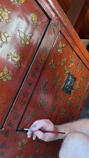 Delightful 19th century, Chinese red lacquered and gilt chinoiserie decorated elm sideboard.