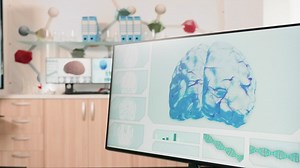 Doctor studies DNA models in futuristic medical office - Free Stock Video