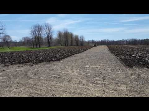 John deere m plowing in 3rd gear with 2 bottom plow