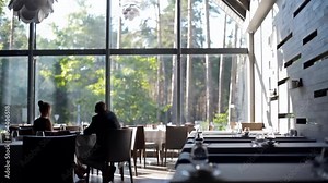 Man and woman eating them at the restaurant