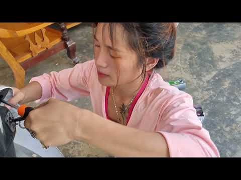 Full video of a girl mechanic repairing and maintaining motorbikes and electrical equipment