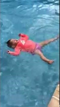 Baby falls into pool and back floats on her own!