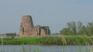 Historic abbey ruins on the river bank