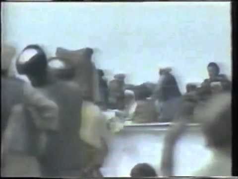 Mullah Omar Raising Prophet's Cloak