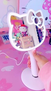 7.8K views | “my new hello kitty mirror☁️ it’s so cute and very easy to set up, I’m obsessed!” - @caughtincandyy and the cutaway unboxing of the Hello Kitty LED Handheld #hellokitty #sanrio #handheldmirror #supercute #unboxing #pink #aesthetic #asmr #kawaii #pinkroom #sanriogirl #hellokittylover | Impressions Vanity Co. | Facebook