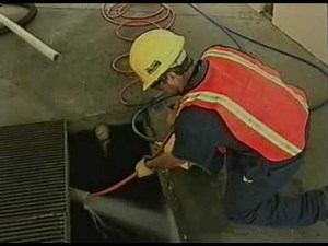 Vac-Tron Car wash clean out with an industrial vacuum