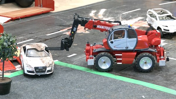 RC Firefighters and Rescue Vehicles in Motion with Heavy Machinery