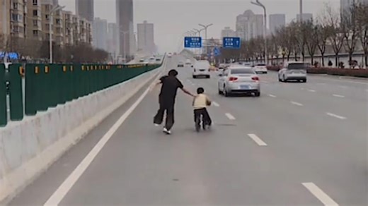 Child rescued by heroic driver after crossing four lanes of traffic on balance bike