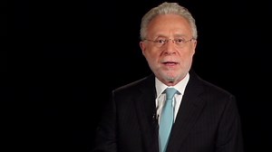 Where did Wolf Blitzer get that name?