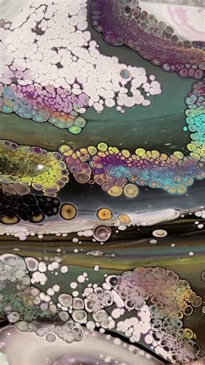 This is an oldie. It's a flip cup with silicone, and while black was one of the colors layered into my cup, how I got the cool 3D effect I'll never know. It's a fluid art mystery. I tried several times doing everything as exact as I could, and I never got the effects this painting has! That's the fun of fluid art! 😁 🖼 🤷‍♀️ | Waterfall Acrylics