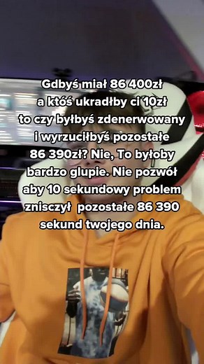 Exploring Gaming Setups: Dimly Lit Orange Hoodie Style