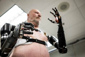 748K views · 29 reactions | Les Baugh lost his arms as a teenager. Engineers at Johns Hopkins are trying to give them back, but better. Mr. Baugh is testing a robotic prosthetic that he can control with his mind. | Video From The New York Times | Facebook