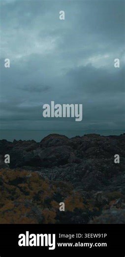 Lighthouse at early cloudy morning - during dusk, time-lapse, wide angle Stock Video Footage - Alamy