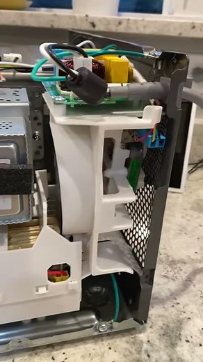 LG Inverter Microwave - not heating & making click/hiss noise...any ideas???