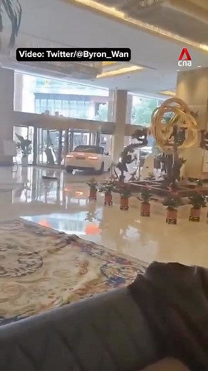 An angry guest smashed his sports car into the lobby of a hotel in Shanghai, leaving a trail of destruction after arguing with staff about his missing laptop. | CNA