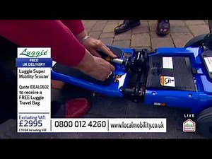 Luggie Folding Mobility Scooters Customer, Judi, lifts Luggie into her car.