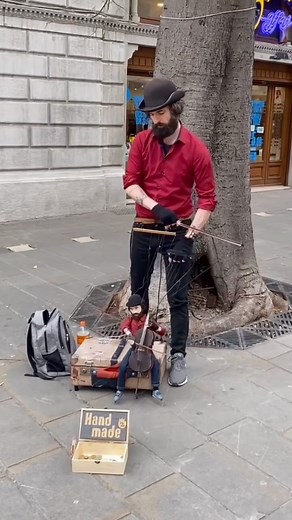 Arts Promote 🎨 on Instagram: "Márton Harkel is a Hungarian master puppeteer renowned for his intricate handcrafted marionettes and captivating street performances. His artistry gained international recognition through collaborations with artists like The Piano Guys, notably in their 2020 music video for "Pictures at an Exhibition," where he operated puppet versions of the musicians. Artist: @harkelspuppetry Video: @pluhar_violins #art #streetart"