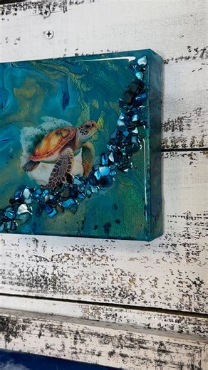 6K views · 107 reactions | Acrylic paint pour, with a sea turtle transfer, deep aqua crushed shell, and resin! Let me know if you want the link to the shell or transfer! #deepsouthshelling #resinart #glassart #shellart #shatteredglass #coastaldecor #seaturtle | Mettle Modern Design | Facebook