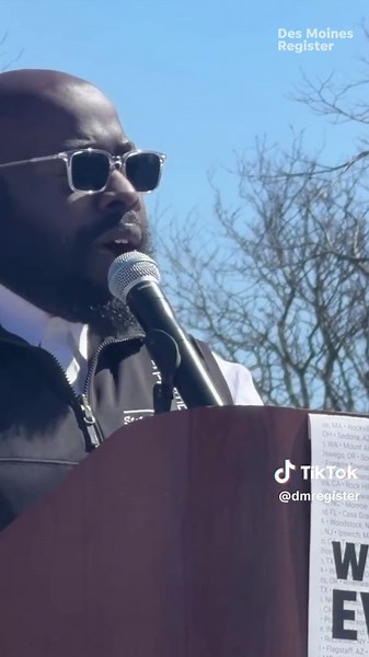 The sun greeted No Kings Day ralliers as they filled an entire city block in downtown Des Moines. They held banners that blew in the brisk winds, which read