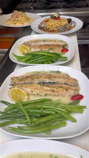 Fresh branzinos and calamari