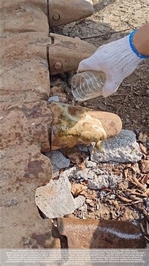 The excavator was being descaled; the rust came off easily with just a spray of water.