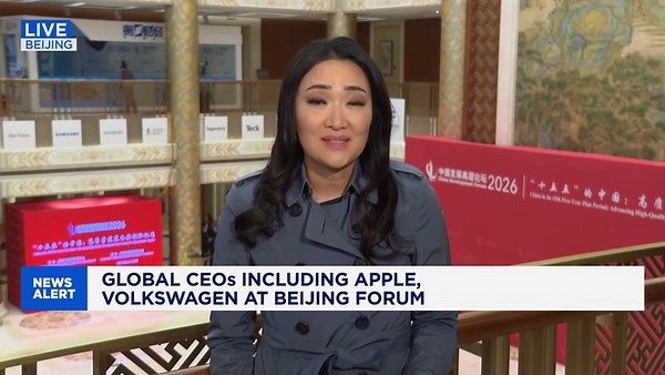 China pledges further economic opening amid trade strains