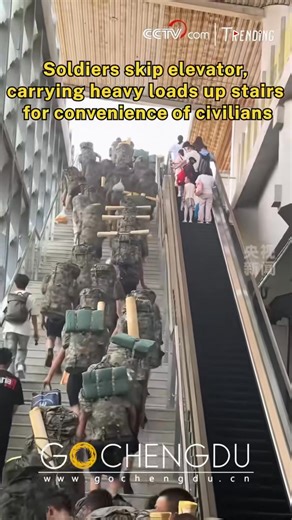 In Changxing County, Zhejiang, soldiers carrying heavy gear chose to climb a long flight of stairs instead of using the elevator—so the public could have easier access. A small act, yet a powerful show of selflessness and respect. 🙏 #Trending #China #Respect #Soldiers #viral | Go Chengdu