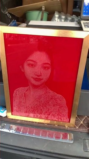 Engraving a glass painting using a 40W CO2 laser engraver.