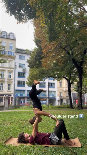 Acroyoga | Workshops | Community on Instagram: "Easy beginner pose: shoulder stand. To make it harder, you can let the flyers hands let go of the legs :)"