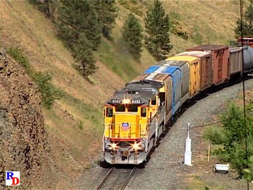 A remote scenic location on Union Pacific's La Grande Subdivision and an eastbound manifest freight with recently implemented DPUs at the rear (formerly manned helpers). From the Highball Productions show "Union Pacific’s Oregon Blues The La Grande Sub" https://rfd.video/UPBlues | Railfan Depot