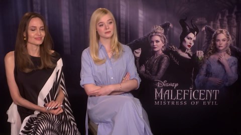 Elle Fanning dazzles in an elegant ivory gown at the Golden Globe Awards