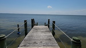 Walk Down To The Private Dock 🚶 https://www.southernshores.com/outer-banks-rentals/0448-sound-barrier | Southern Shores Realty - Outer Banks