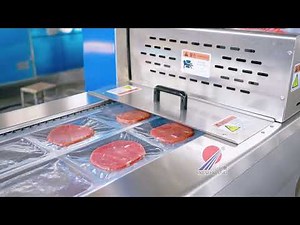 Thermoforming skin packaging machine