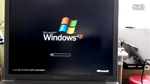 是不是硬盘坏了~XP系统卡死在开机启动