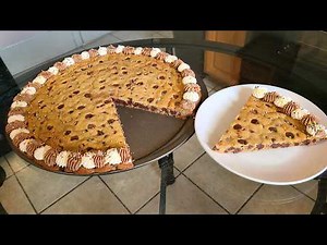 Homemade chocolate chip cookie cake | A large soft chewy moist cookie with a buttercream frosting