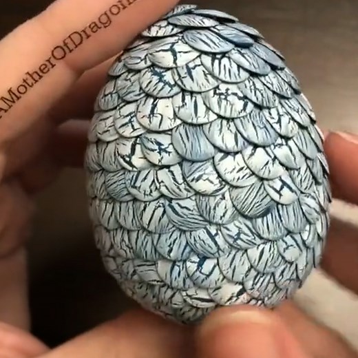 5M views · 77K reactions | This woman makes her very own 'dragon eggs', and they're absolutely stunning  | UNILAD | Facebook