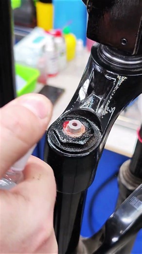 Surface cleaning of a bicycle suspension fork.