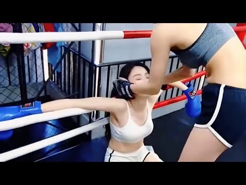 Boxing Training Session​Sparring in the Ring​Female Boxers Practice