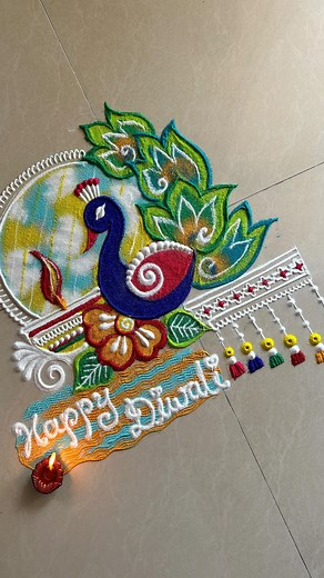 Poonam Patil on Instagram: "Diwali special peacock rangoli design! 🪔✨ #freehand #peacock #diwali #rangoli #happydiwali #festivities #rangolidesigns #relaxing #rangoliart #festive #homedecor"