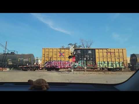 Csx southbound freight train through georgiana alabama from the car