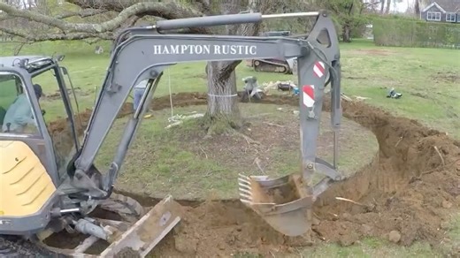 Hampton Rustic Landscapes on Instagram: "The art and science of a successful tree move begins below the surface. 🌳 This time lapse captures a linden tree carefully excavated over several days and its root ball tightly wrapped by hand through intricate rope work. This process protects the root structure, holds the soil intact and helps retain moisture so the tree can be moved with stability and minimal transplant shock. From precise digging to root preservation and secure wrapping, these are the