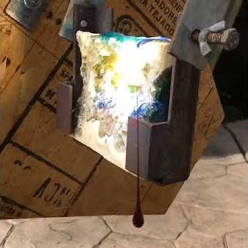 Melting Red Glass With A Giant Magnifying Glass