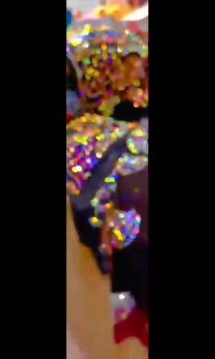 Intricate Sequin Patterns on Fabric Close-Up